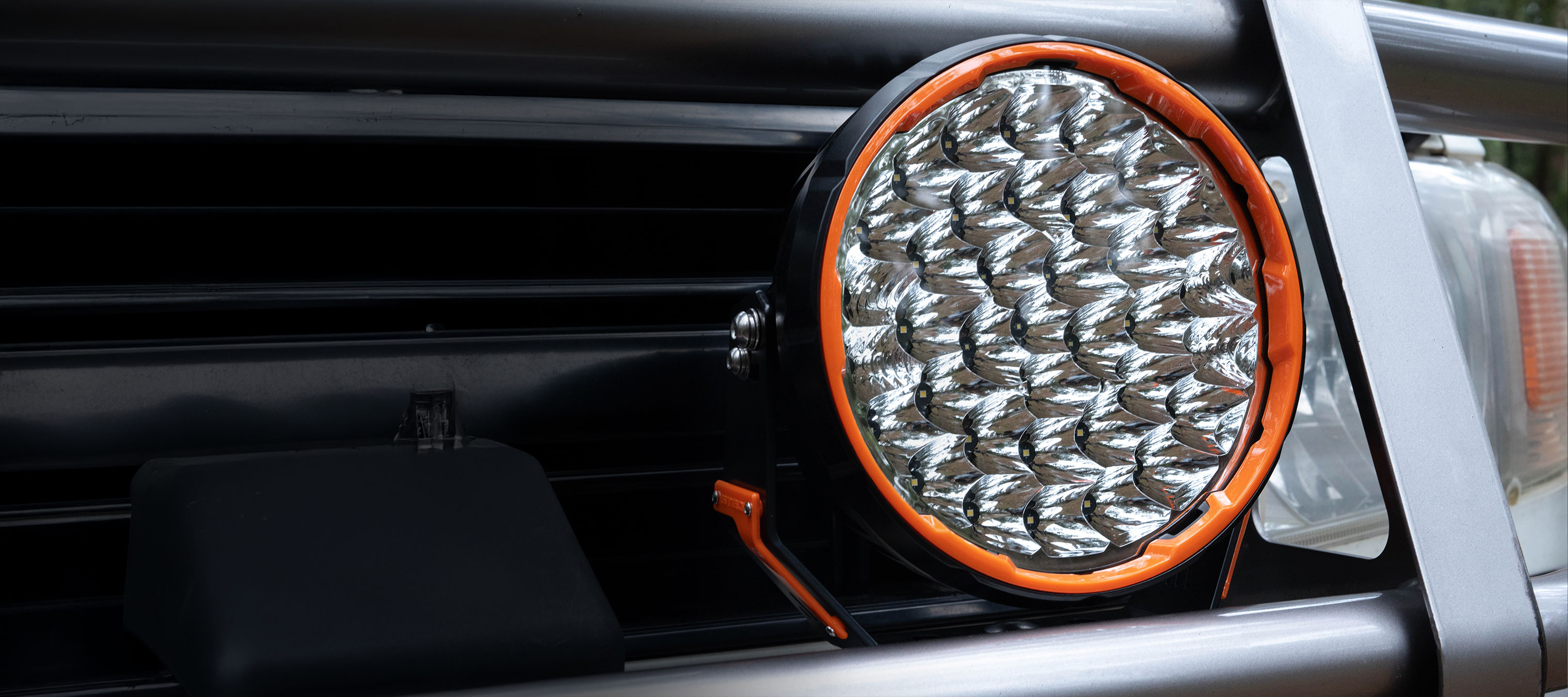Closeup of a Sport Plus LED Spot Light, fit to an ARB Bull Bar.