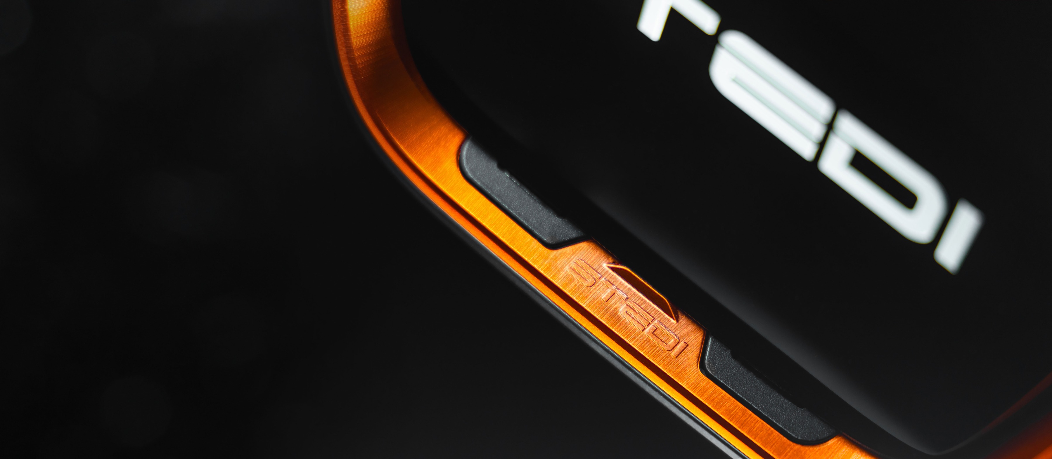 Closeup of a metallised orange fascia on an EVO led driving light.